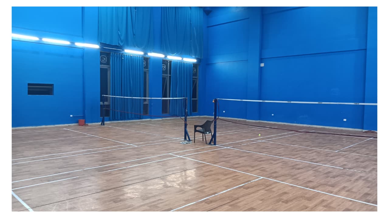 <em>The badminton court, present day.</em>